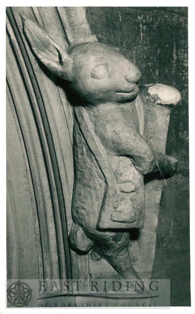 St Mary’s Church interior, rabbit carving on label stop east side of Sacristy door, Beverley c.1900s