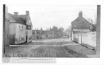 Village street from north with Black Swan and cross, Brandesburton 1900s